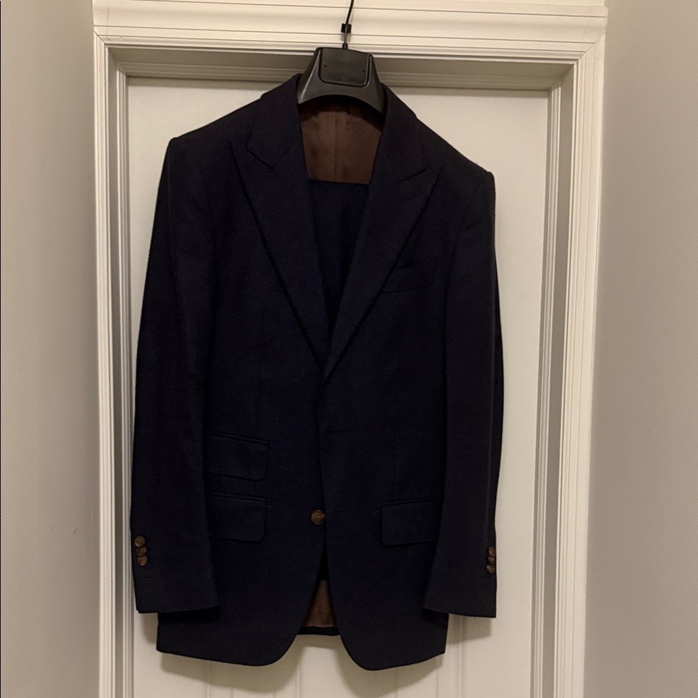 Men's Navy Wool suit - small tear on left sleeve